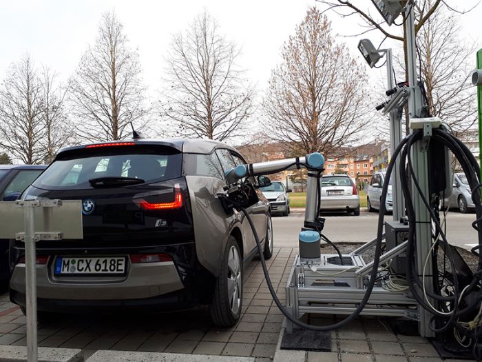 Robotic system for recharging EVs